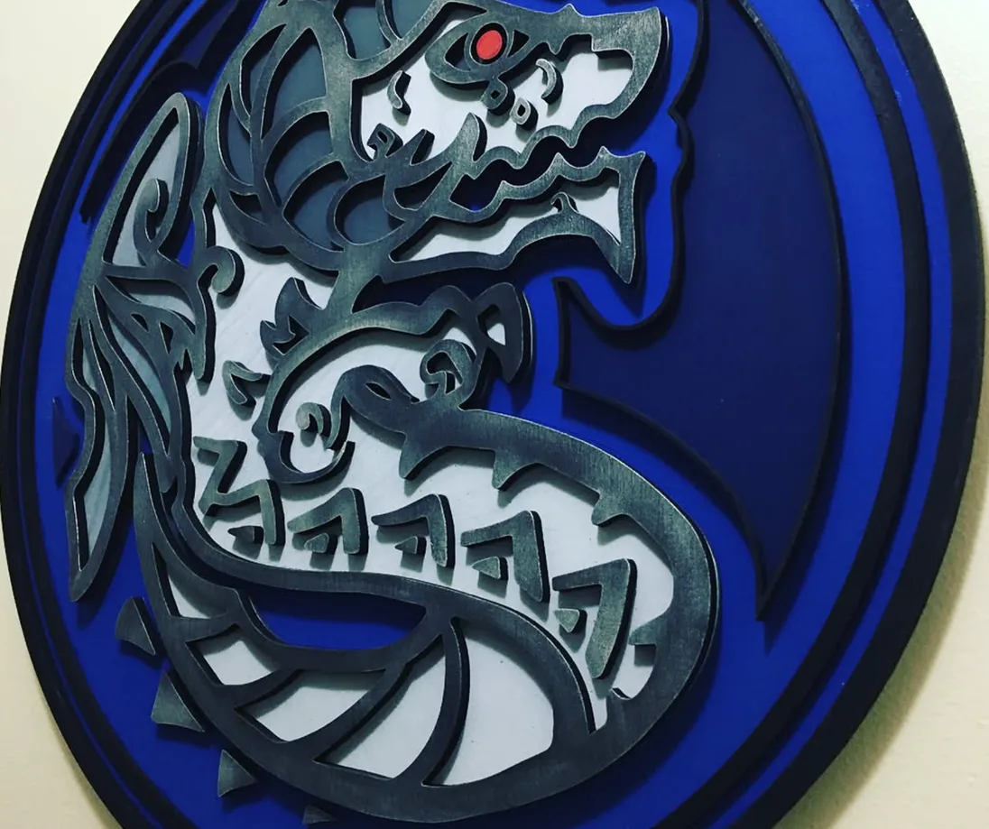 Blue dragon layered 2.5D art print, oval shape on wall